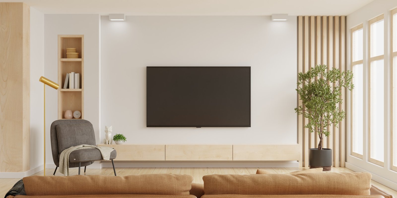 White wall mounted tv on cabinet in living room.